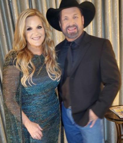 August Anna Brooks father with his wife Trisha Yearwood